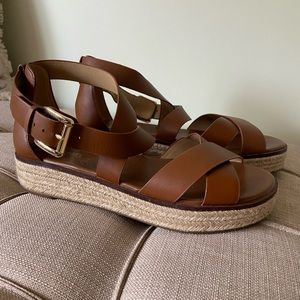Michael Kors tan sandals. Great condition. Gold hardware. 9.5 smoke free home